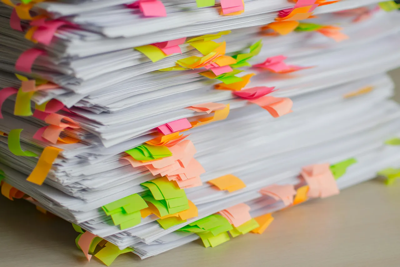 Pile of papers with tabs