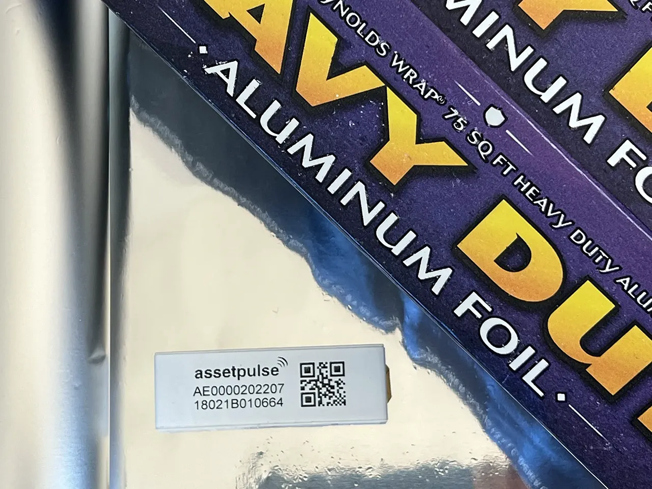 An AssetPulse RFID tag placed on some aluminum foil