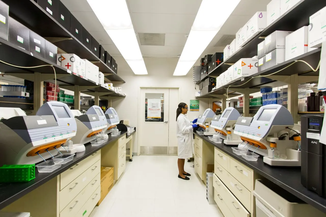 Scientist working with laboratory equipment tracked by AssetPulse RFID technology
